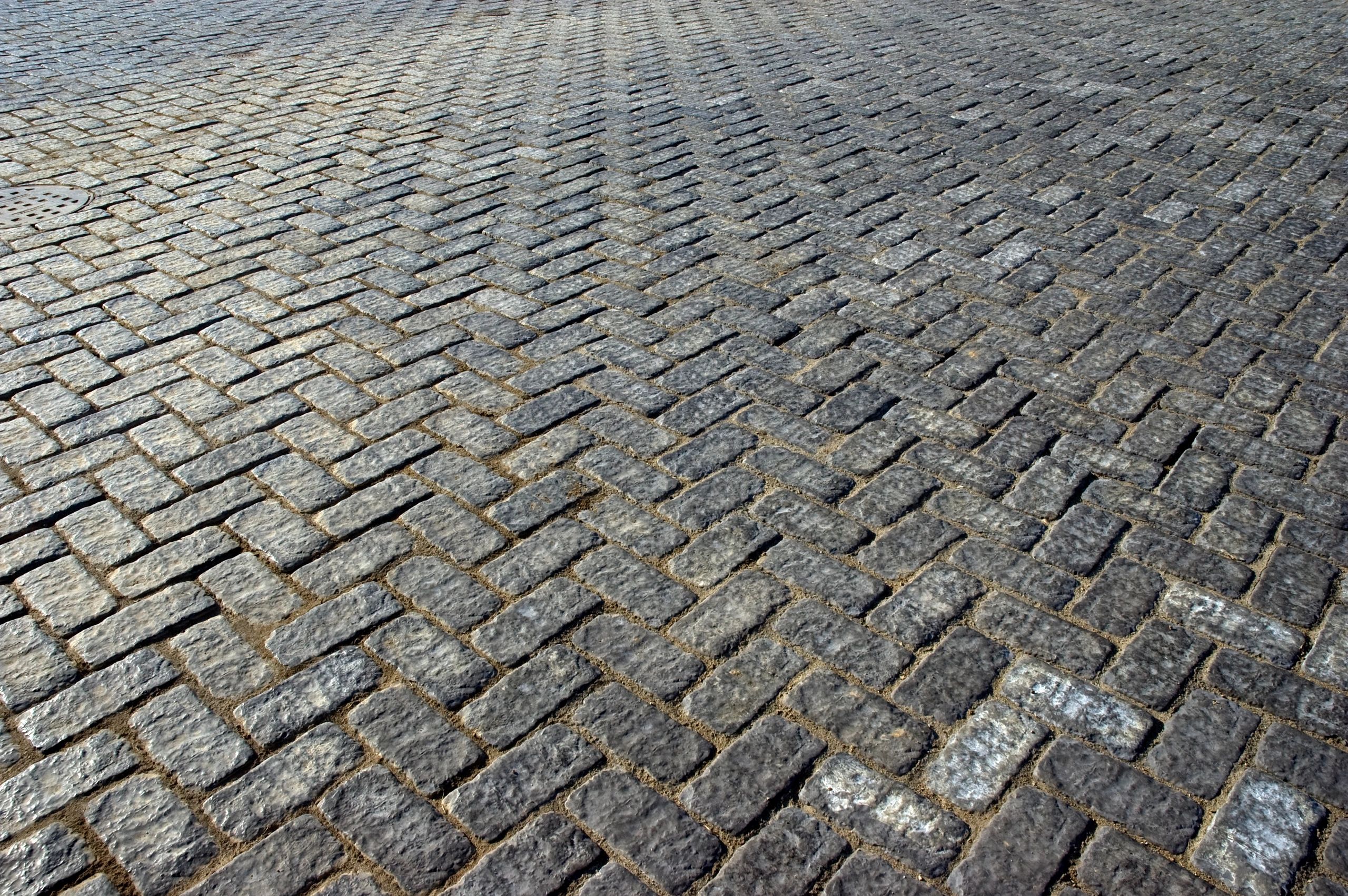 Brick paver driveway with clean pattern and edging