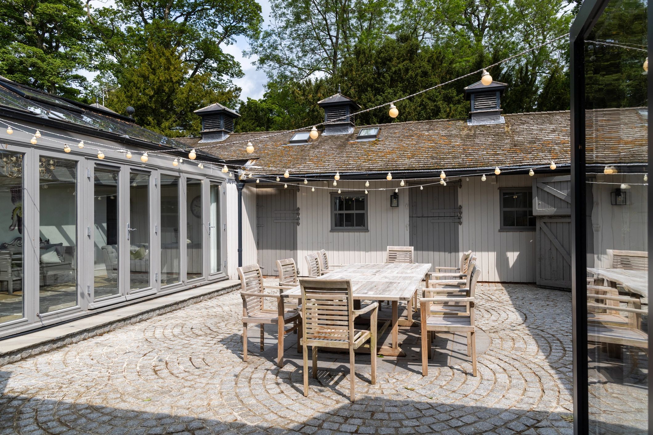Outdoor courtyard patio with stone paving